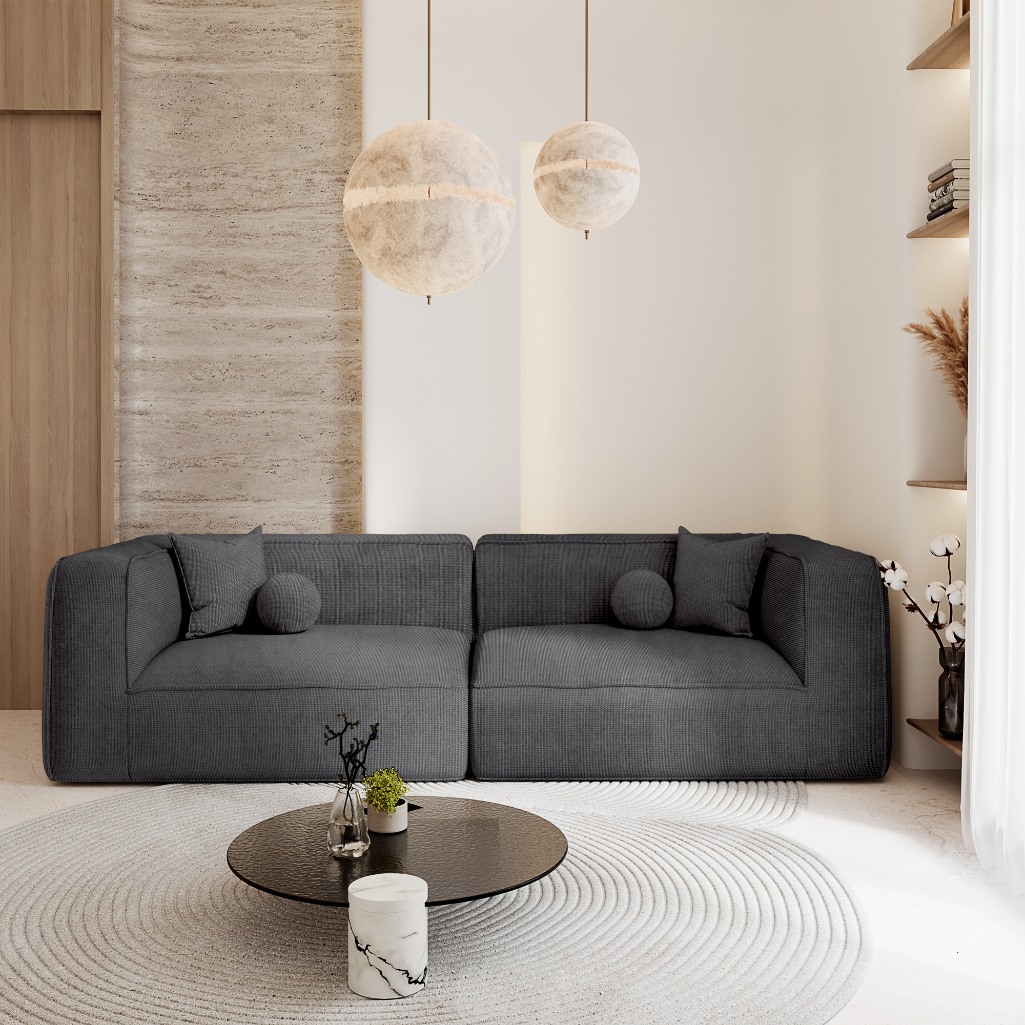 Canapé design en tissu tramé gris anthracite dans un salon contemporain, illustrant l’importance de choisir un revêtement résistant selon le test Martindale pour garantir durabilité et confort au quotidien