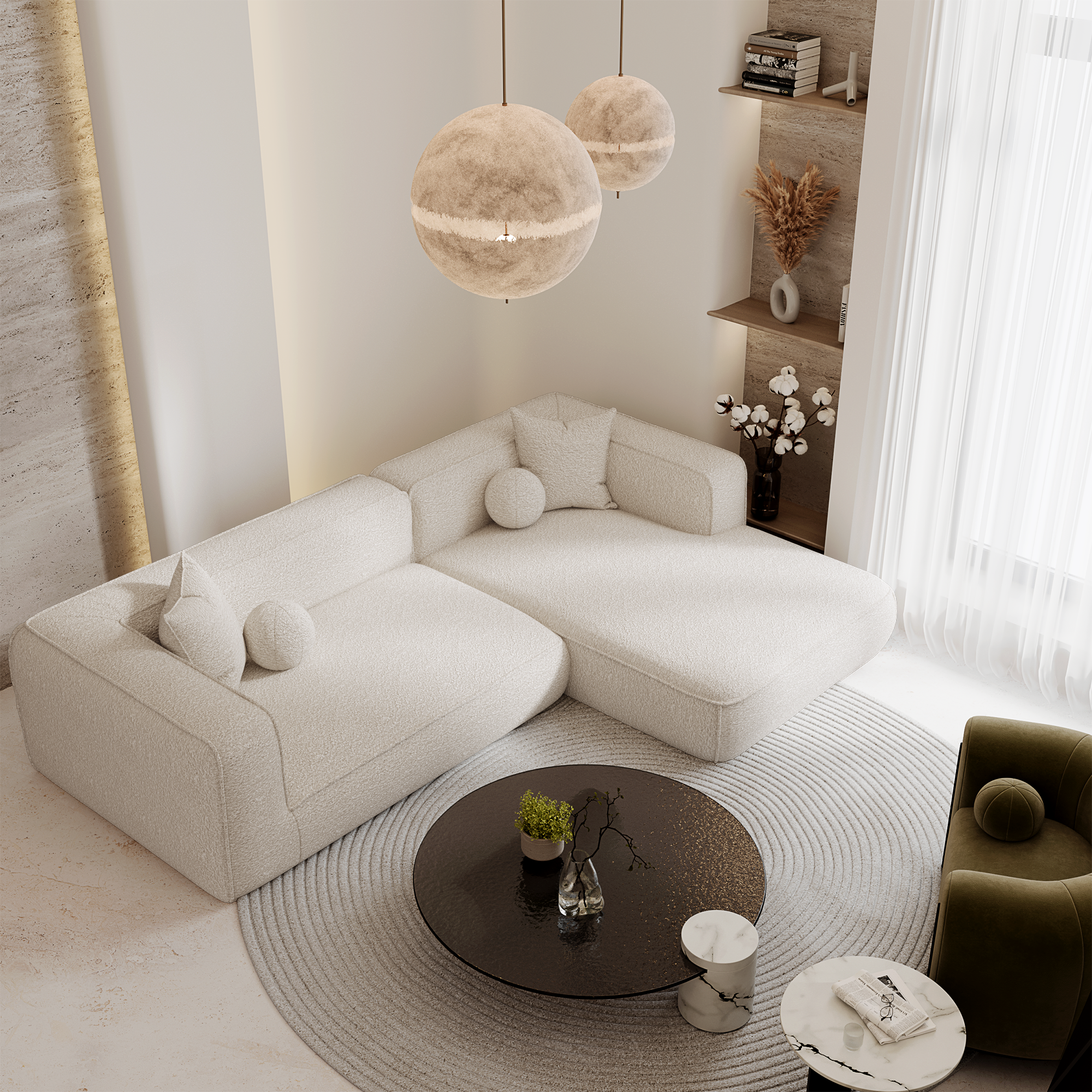 Canapé contemporain aux lignes épurées en tissu crème, harmonieusement intégré dans un salon raffiné à la décoration douce