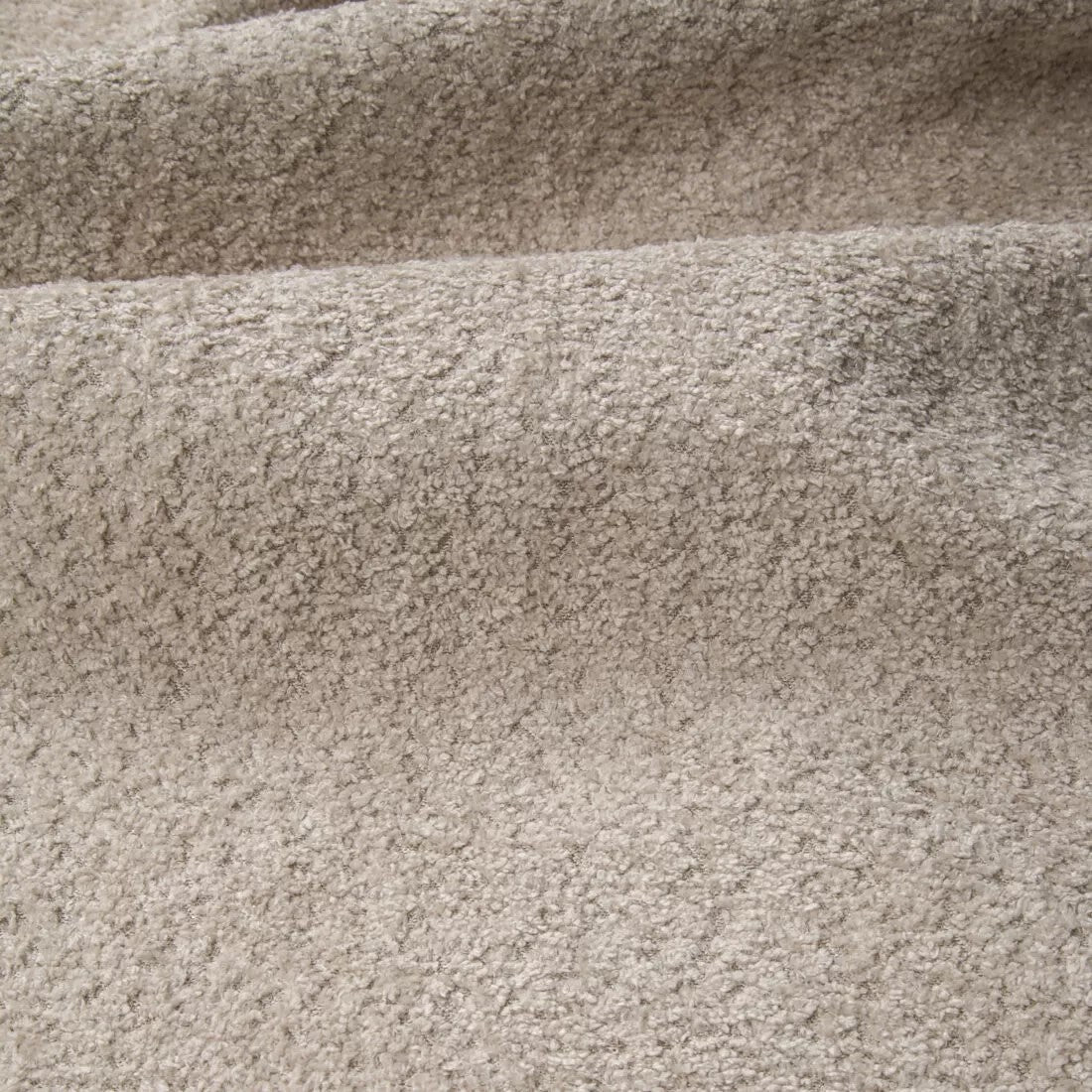Zoom d'un tissu bouclette en beige