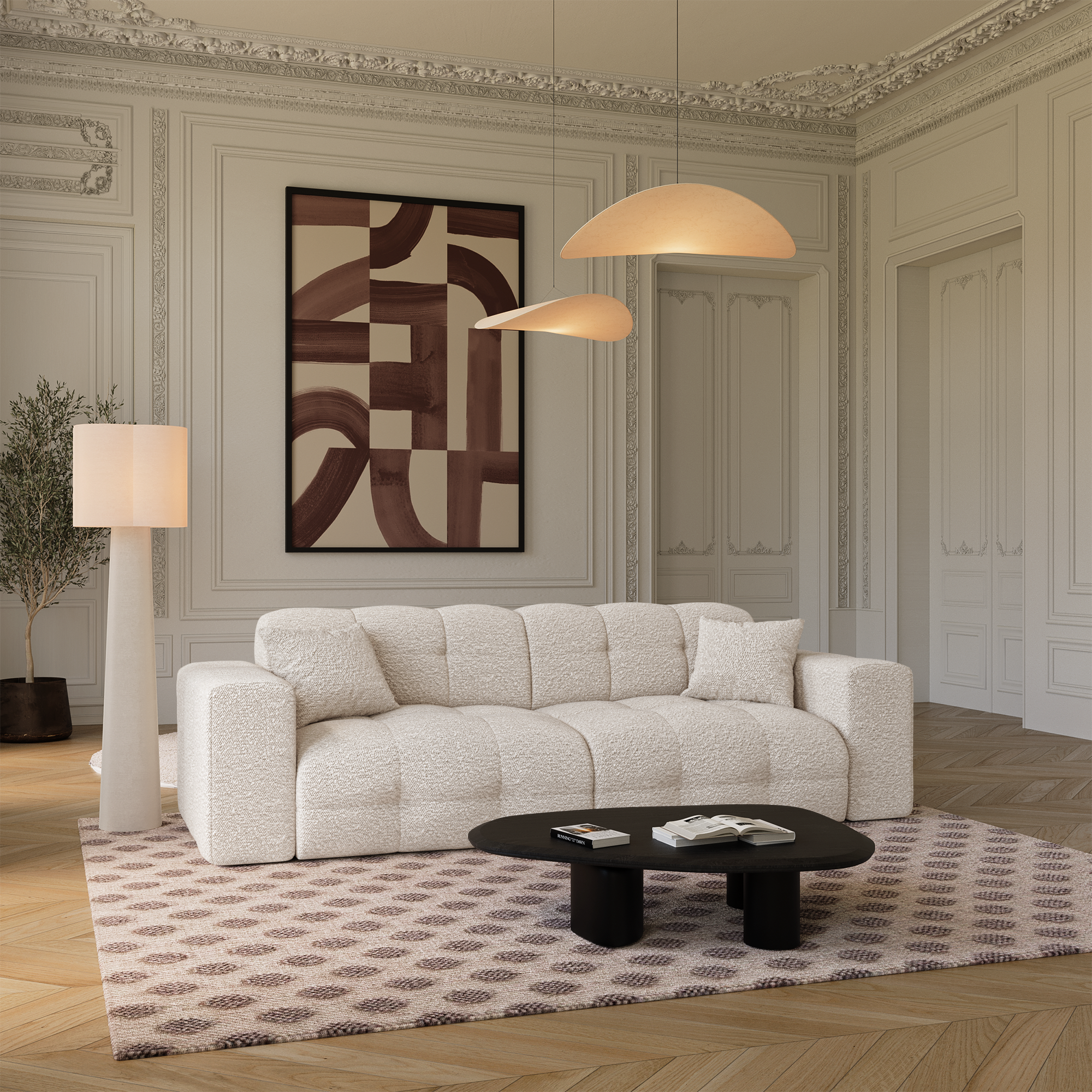 Salon haussmanien avec un canapé en tissu bouclette et une table basse en bois noire, pour une ambiance chic