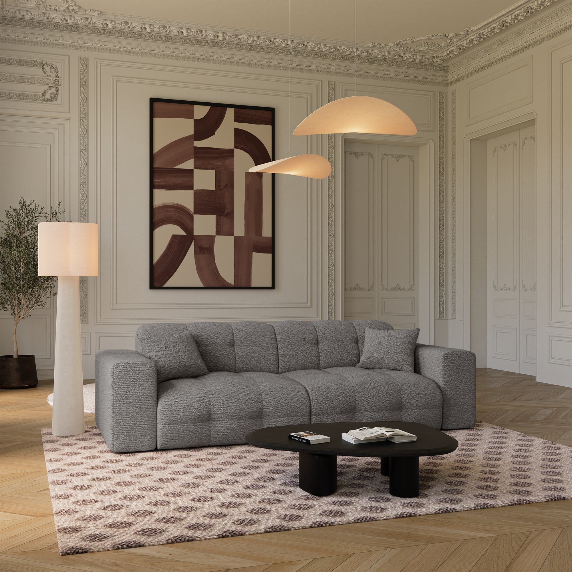 Un canapé 4 places en tissu bouclette gris graphite dans un décor classique