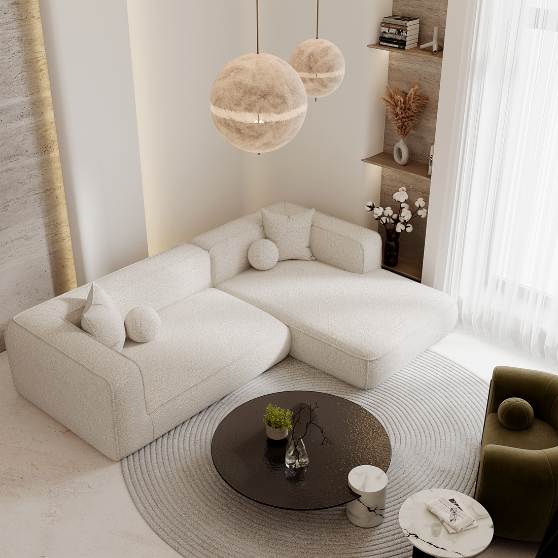 Canapé contemporain aux lignes épurées en tissu crème, harmonieusement intégré dans un salon raffiné à la décoration douce